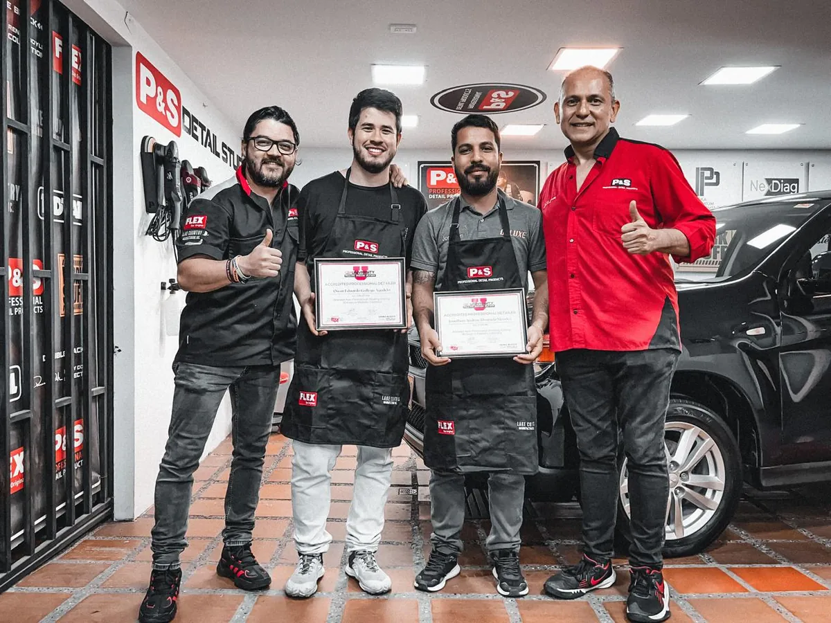 Blessed Holy Detailing team holding P&S detailing certifications