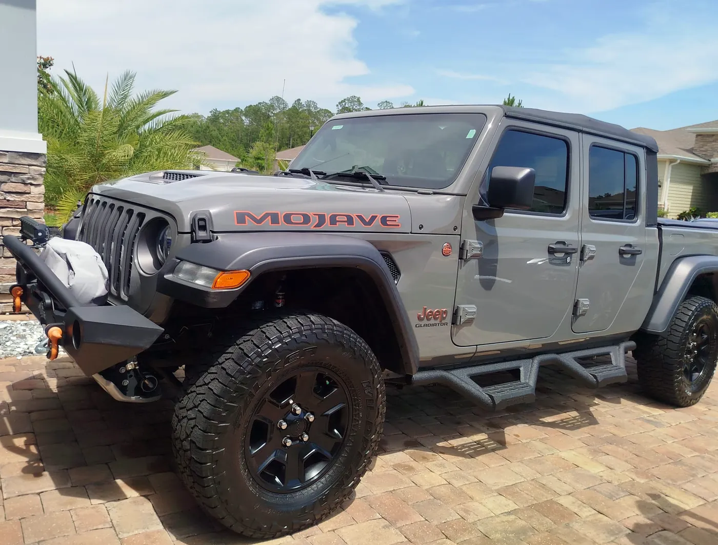 Blessed Holy mobile detailing — Jeep Gladiator detailed in a Jacksonville driveway